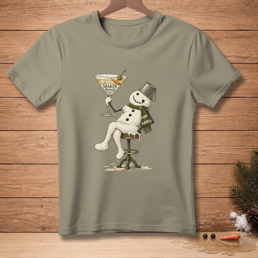Melting snowman with bucket hat and scarf holds martini glass with text "Shaken, Obviously."