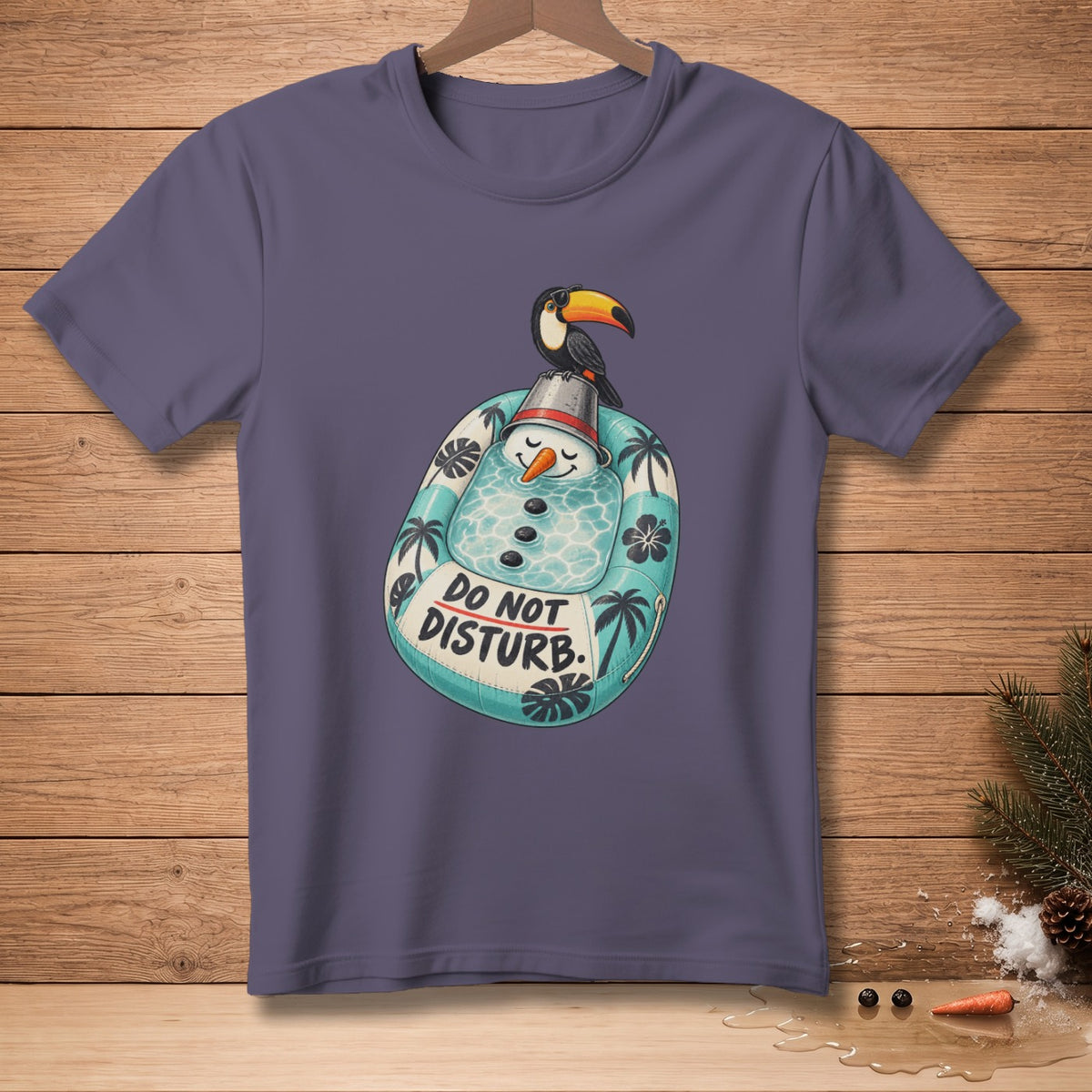 T-shirt graphic of a toucan on a snowman's head, with "DO NOT DISTURB" text.