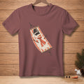 T-shirt with melting snowman in a hammock, wearing a scarf and sleeping mask.