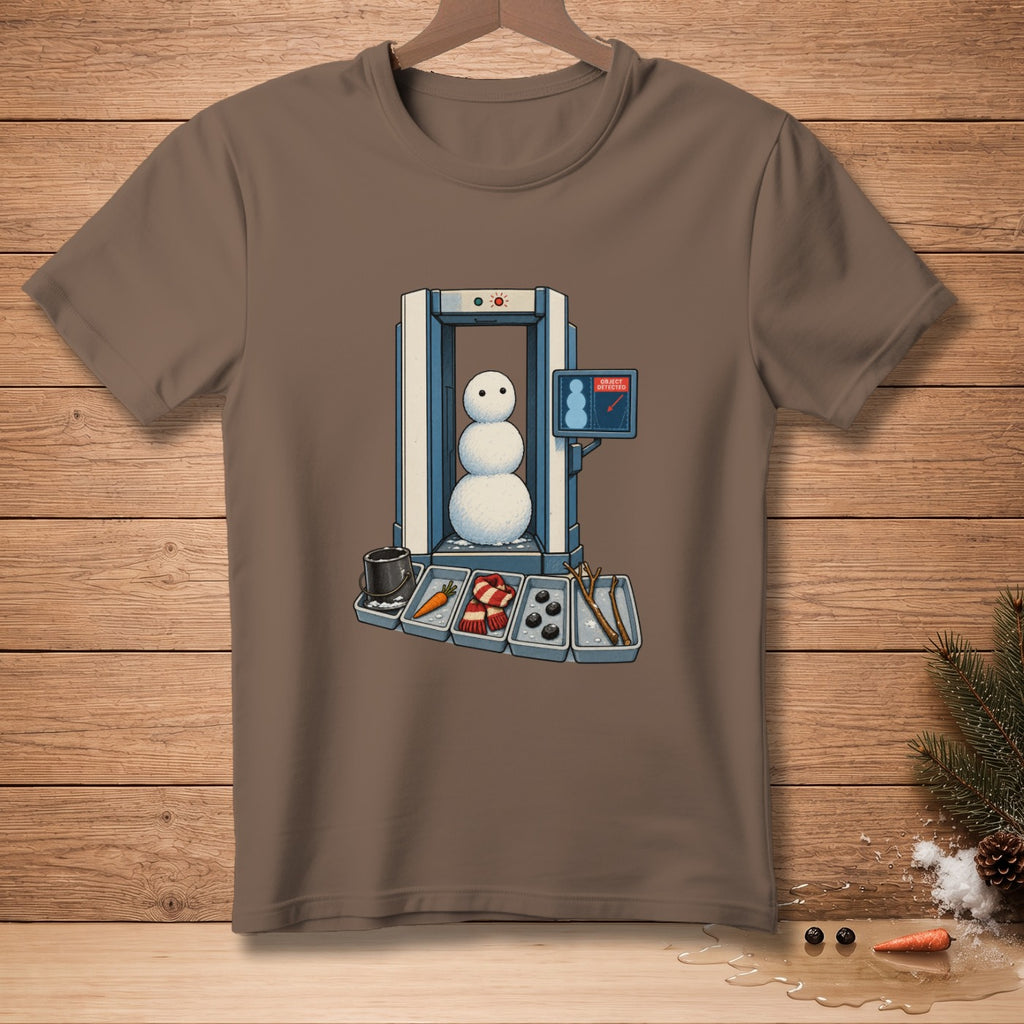Snowman going through airport security with carrot, scarf, and coal.