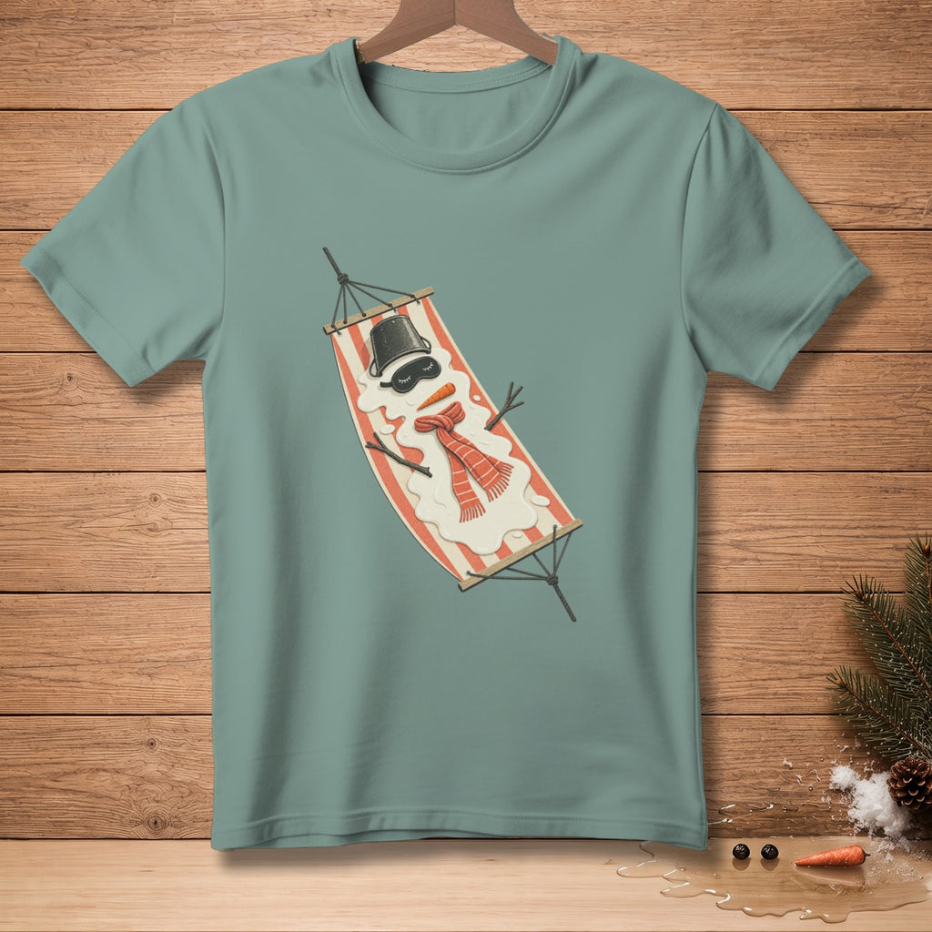 T-shirt with a melting snowman wearing a hat, scarf, and eye mask relaxing in a hammock.