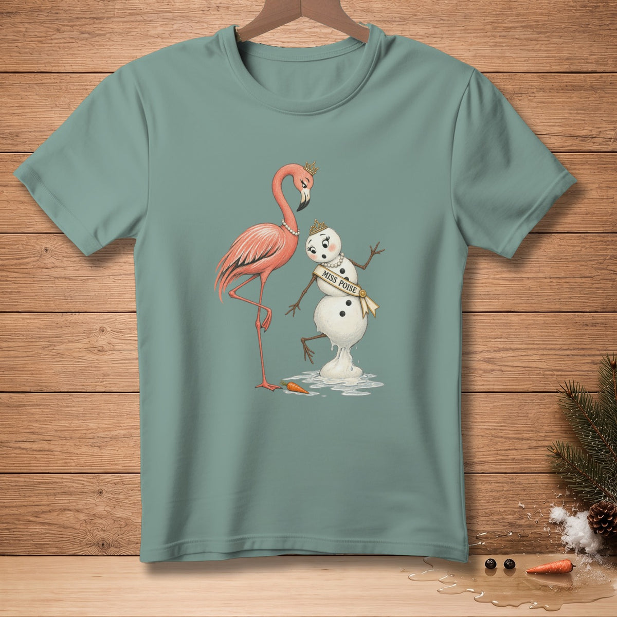 T-shirt with flamingo and melting snowman wearing "Miss Poise" sash.
