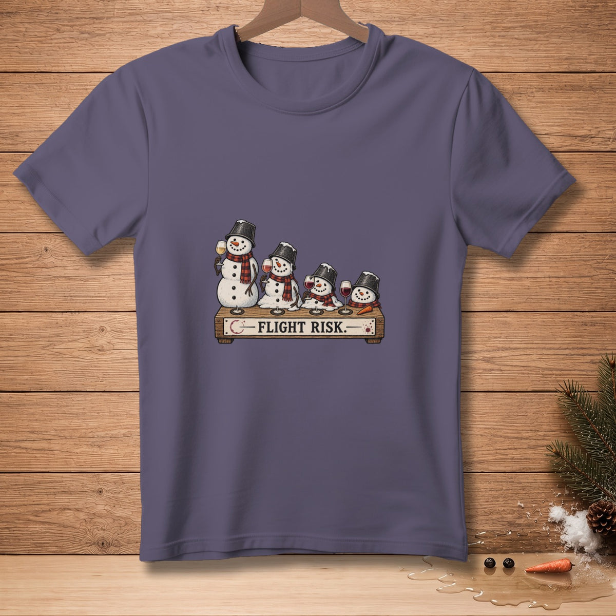 T-shirt with melting snowmen holding wine and the text "FLIGHT RISK."