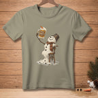 Melting snowman sits on a chair holding a mug that says "Stay Frosty".
