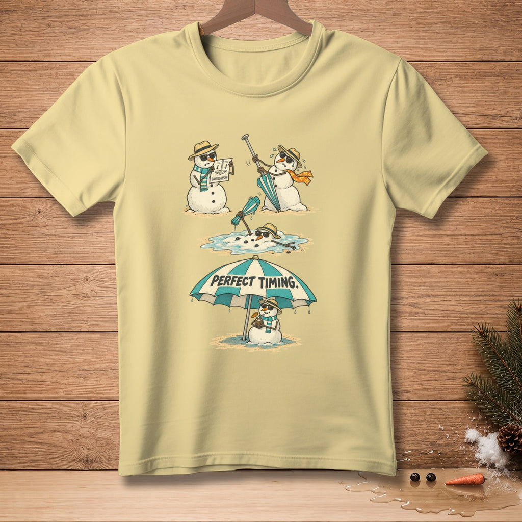T-shirt graphic of snowmen melting under a beach umbrella with "Perfect Timing" text.