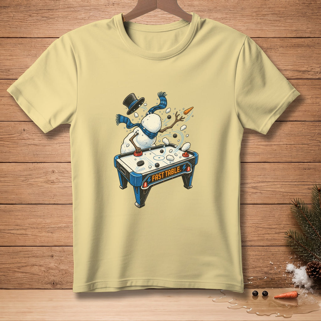 Snowman playing air hockey on a "Fast Table" with a carrot nose.