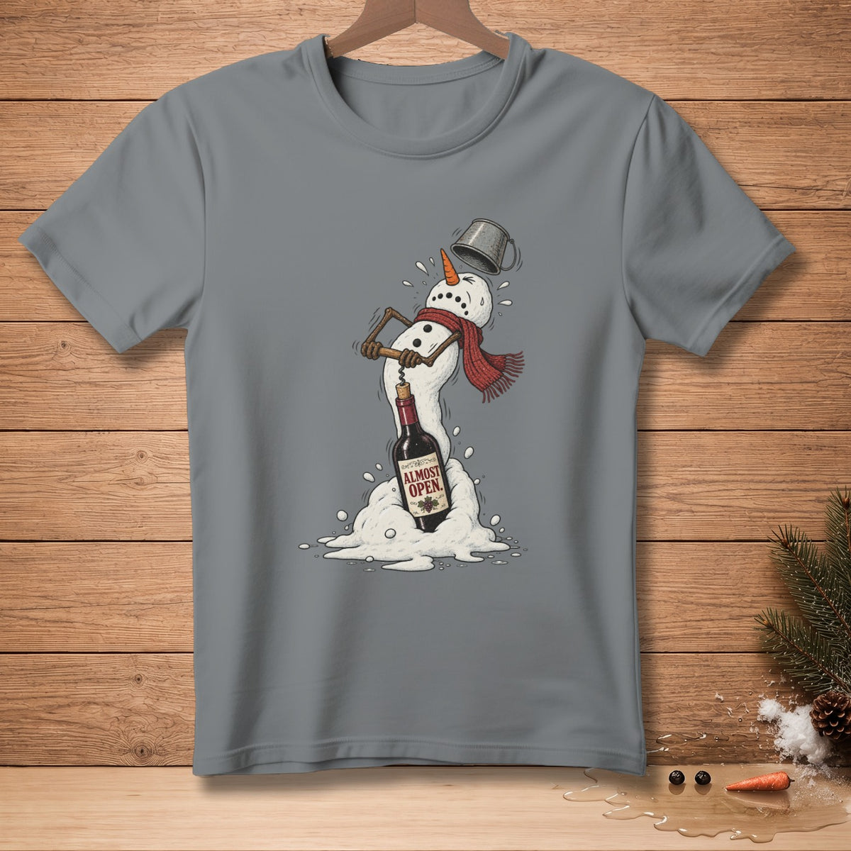 Gray t-shirt with a melting snowman using a corkscrew on a wine bottle labeled "ALMOST OPEN."