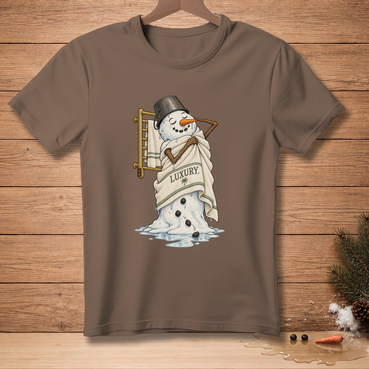 Melting snowman with bucket hat wrapped in towel labeled "LUXURY".
