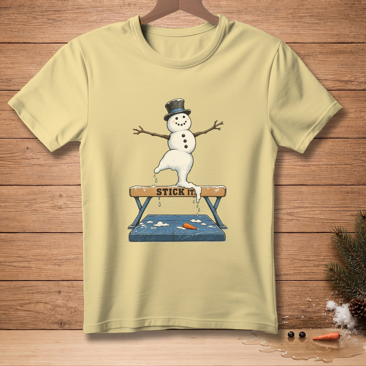 Yellow t-shirt with a melting snowman in a top hat on a vaulting horse.
