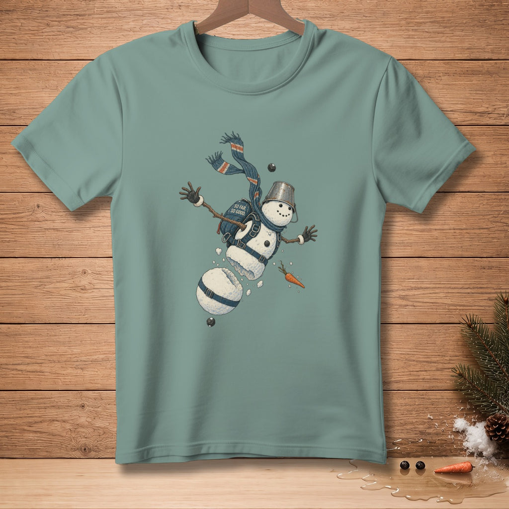 Green t-shirt with graphic of a segmented snowman with scarf, bucket hat, and carrot nose.