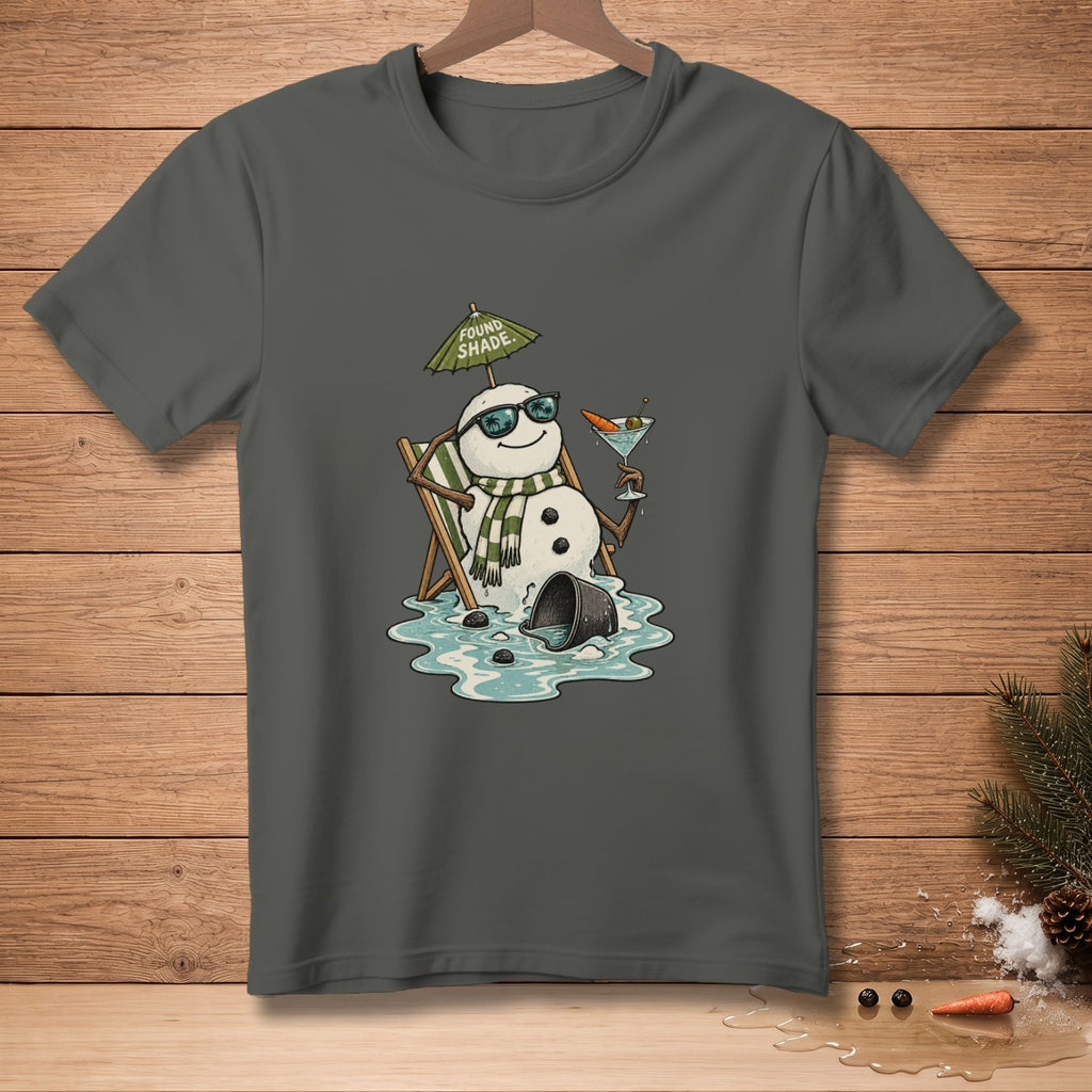 Snowman in beach chair under umbrella holding cocktail with "Found Shade" text.