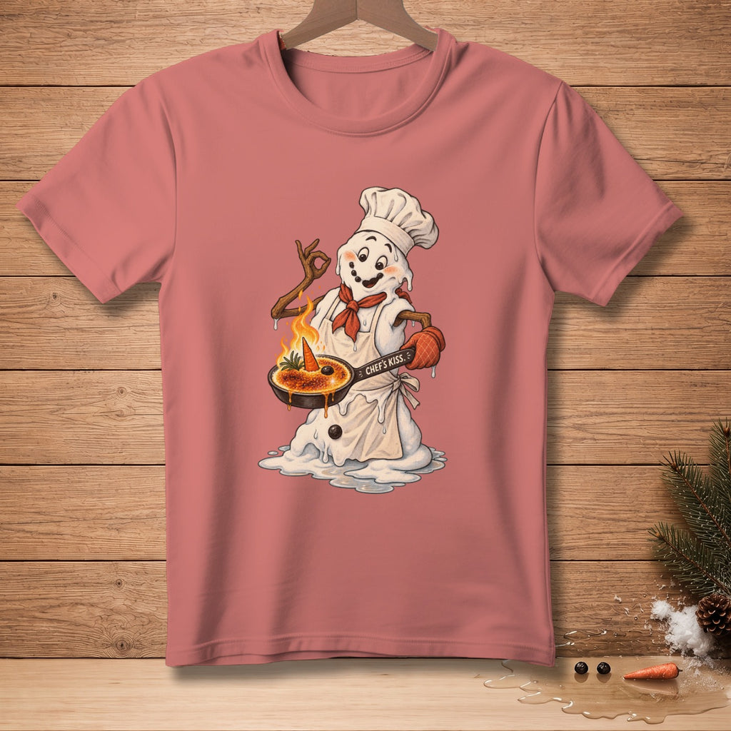 Snowman chef in apron and hat holds flaming dish with text "CHEF'S KISS."
