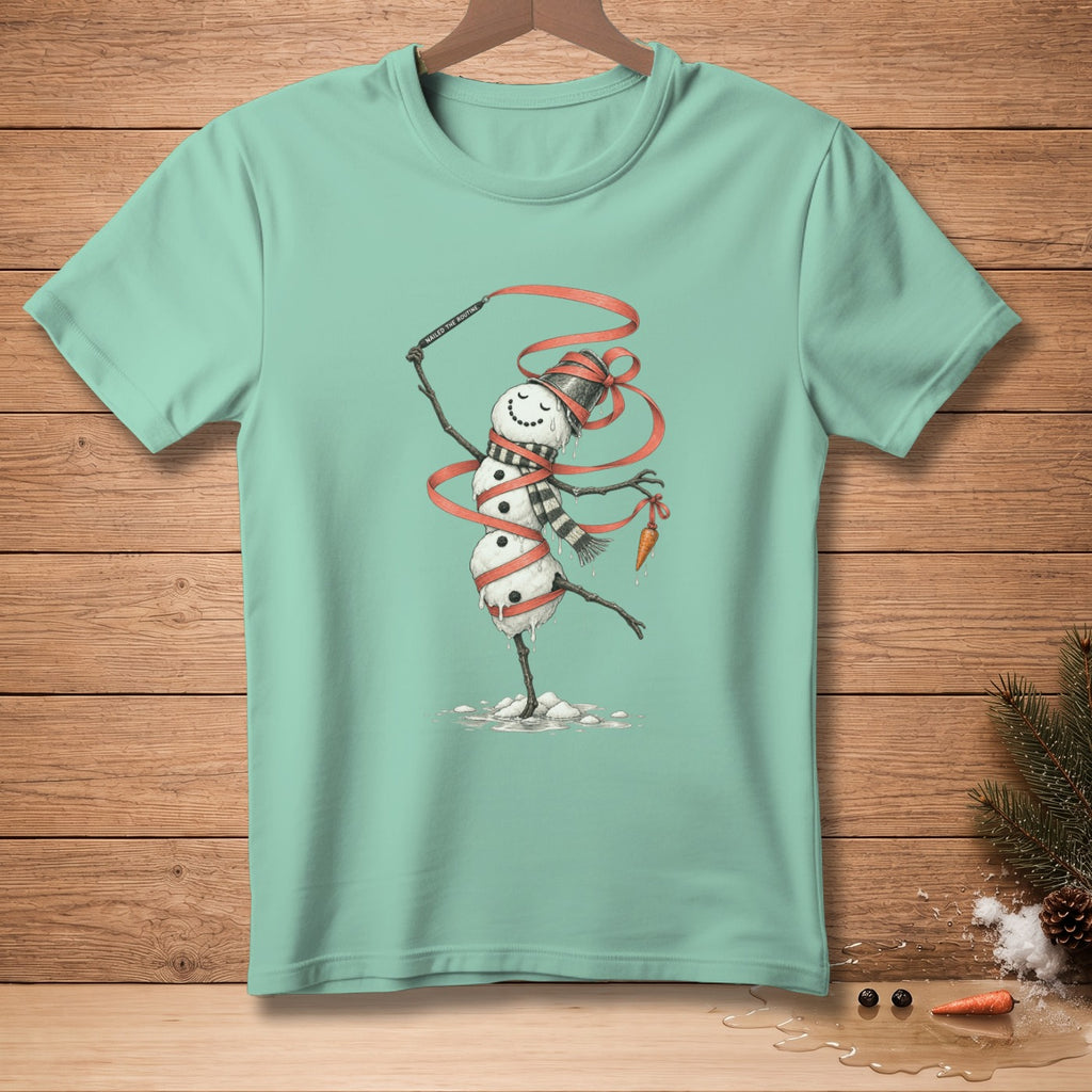 Mint t-shirt with a drawing of a dancing snowman wrapped in red ribbon and holding a carrot.