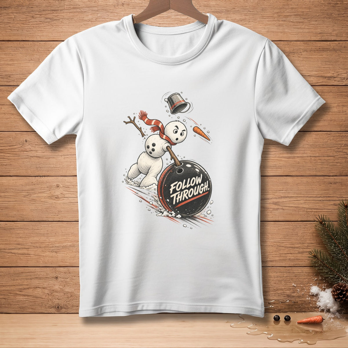 White t-shirt with a cartoon snowman bowling and text "FOLLOW THROUGH."