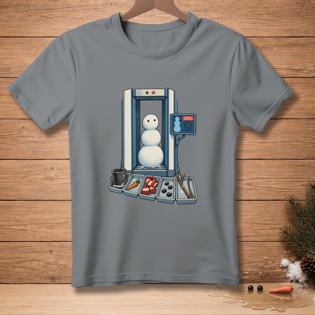 Snowman going through airport security with snowman parts in trays.