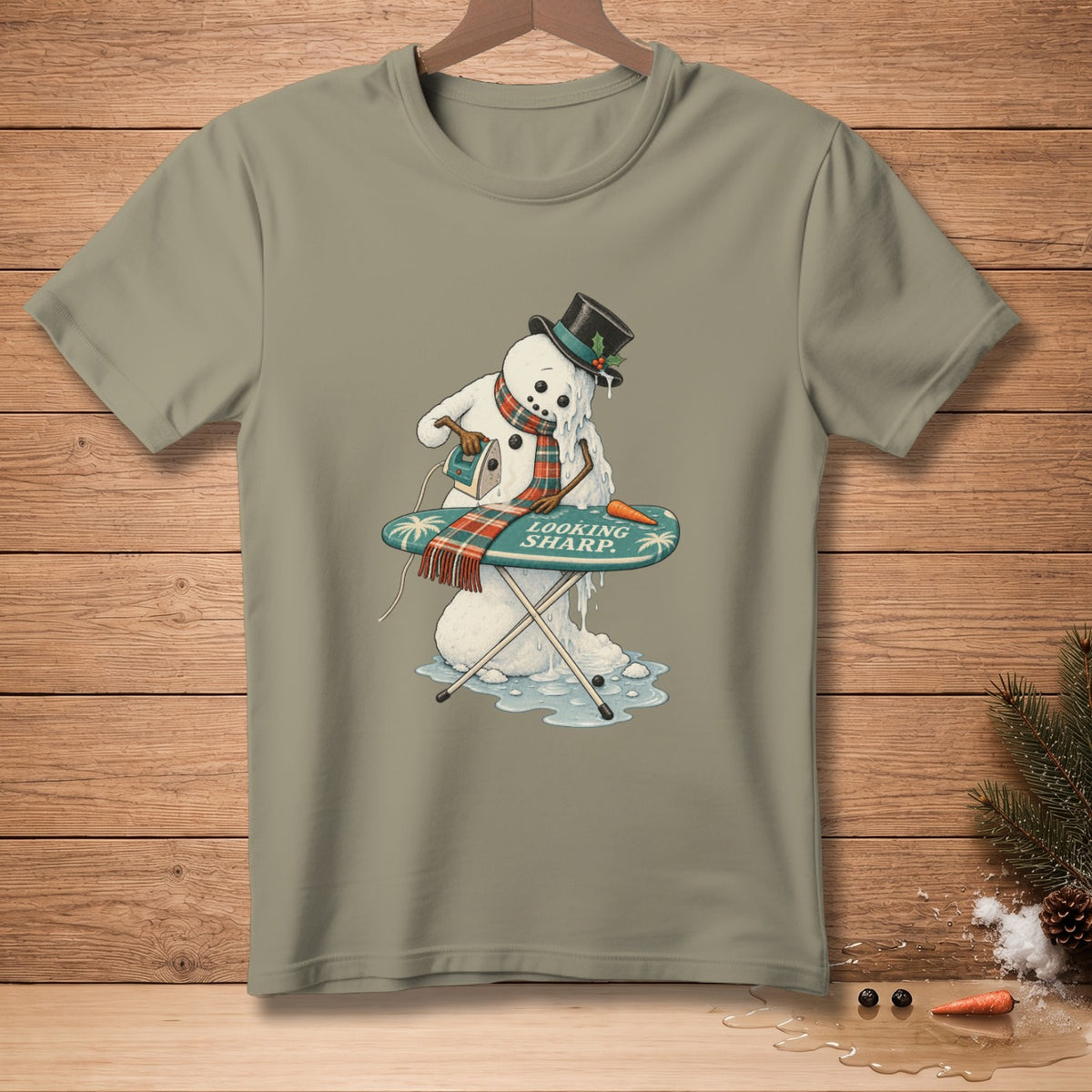 Melting snowman ironing with steam, text "LOOKING SHARP."