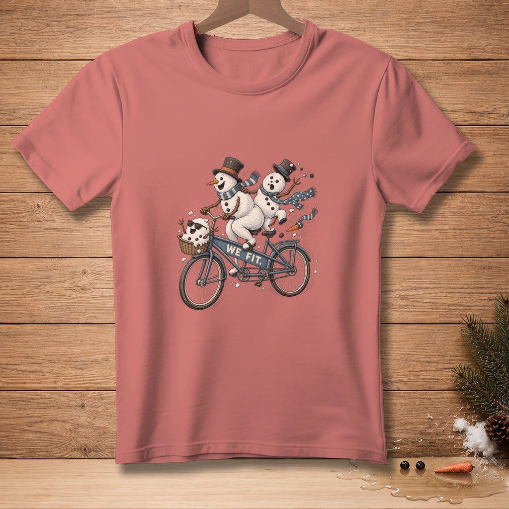 Two snowmen on a tandem bicycle with "WE FIT." text on the frame.