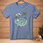 T-shirt graphic with snowmen in a swimming pool under a palm tree.