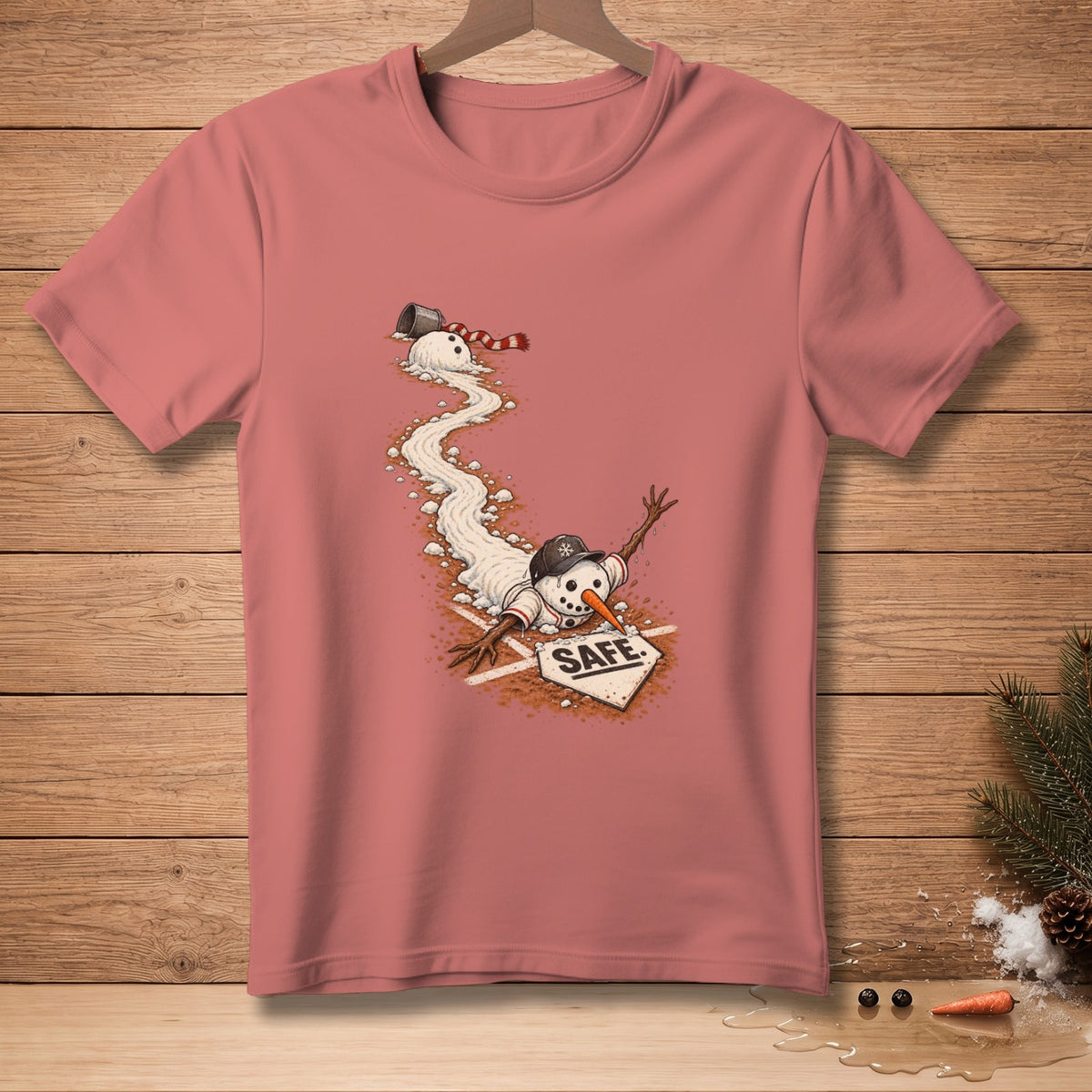 Snowman sliding into base with "SAFE." text on a pink t-shirt.
