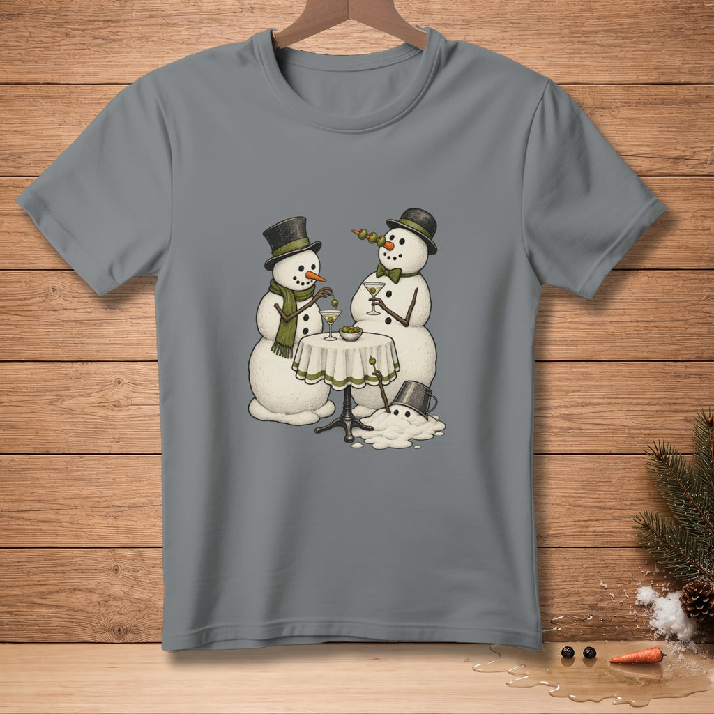 Two snowmen with top hats and scarves enjoy martinis at a table with a melting snowman.