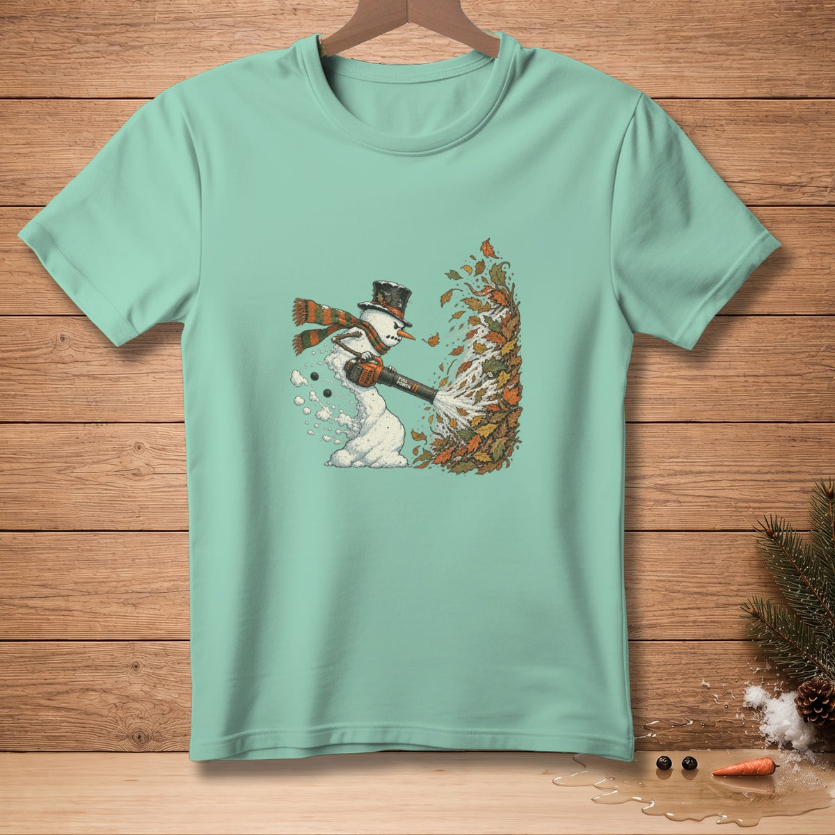 Snowman in top hat and scarf blows leaves with a blower.