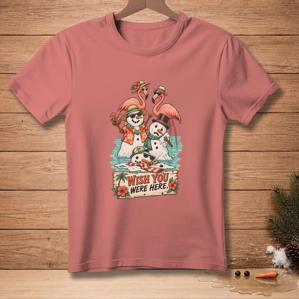 Snowmen and flamingos in water with sign reading "Wish You Were Here".
