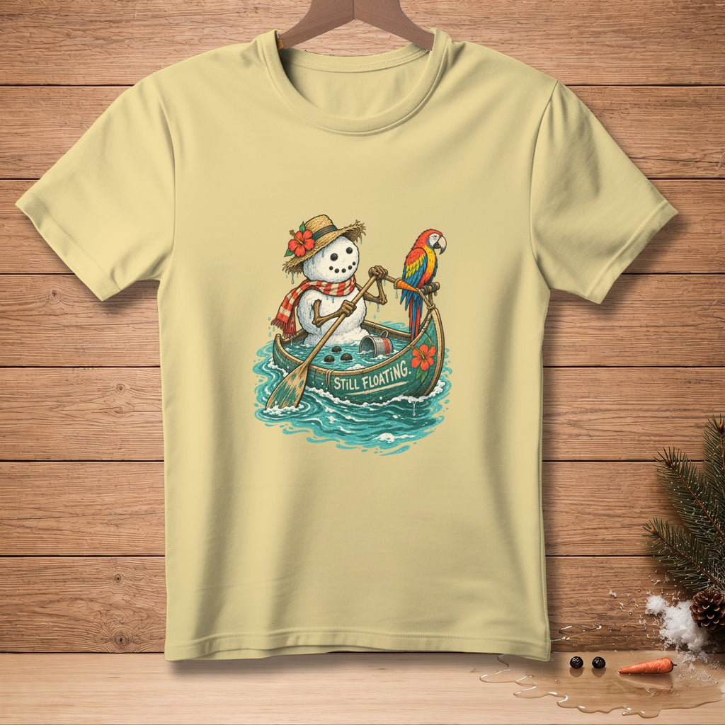 Snowman in a canoe with a parrot, reading "Still Floating"