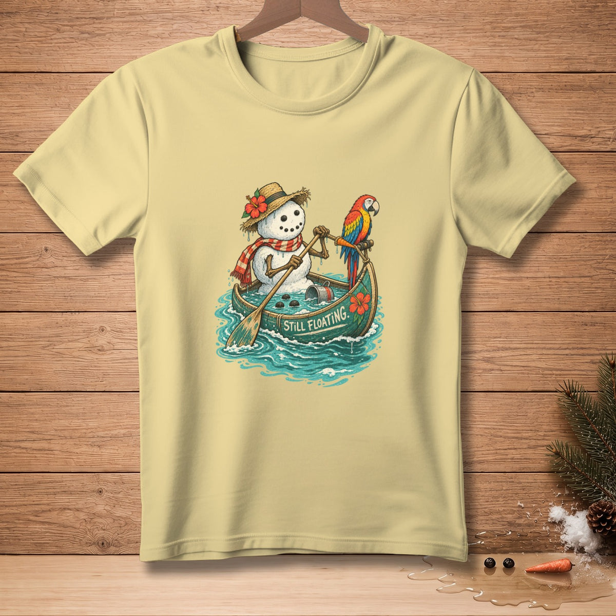 Snowman in a canoe with a parrot, reading "Still Floating"