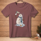 Melting snowman with a hairdryer, text reads "ALMOST DRY" on maroon t-shirt.