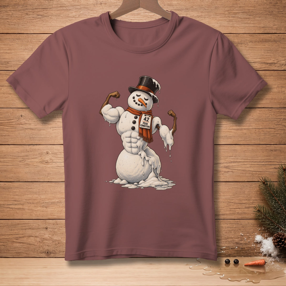 Muscular snowman flexing biceps on a maroon t-shirt with text "42 Peak Condition."