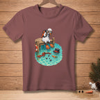 Snowman diver on a dock with scarf, hat, and carrots in the water.