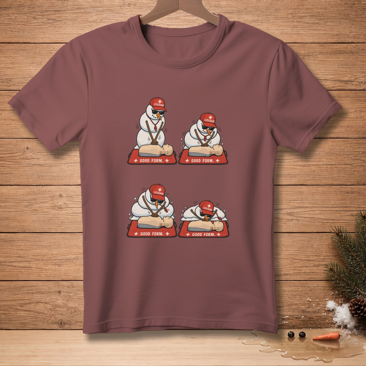 T-shirt graphic of snowmen lifeguards giving CPR with text "Good Form."