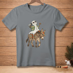 Snowman wearing sunglasses and Hawaiian shirt riding a donkey with a bucket.