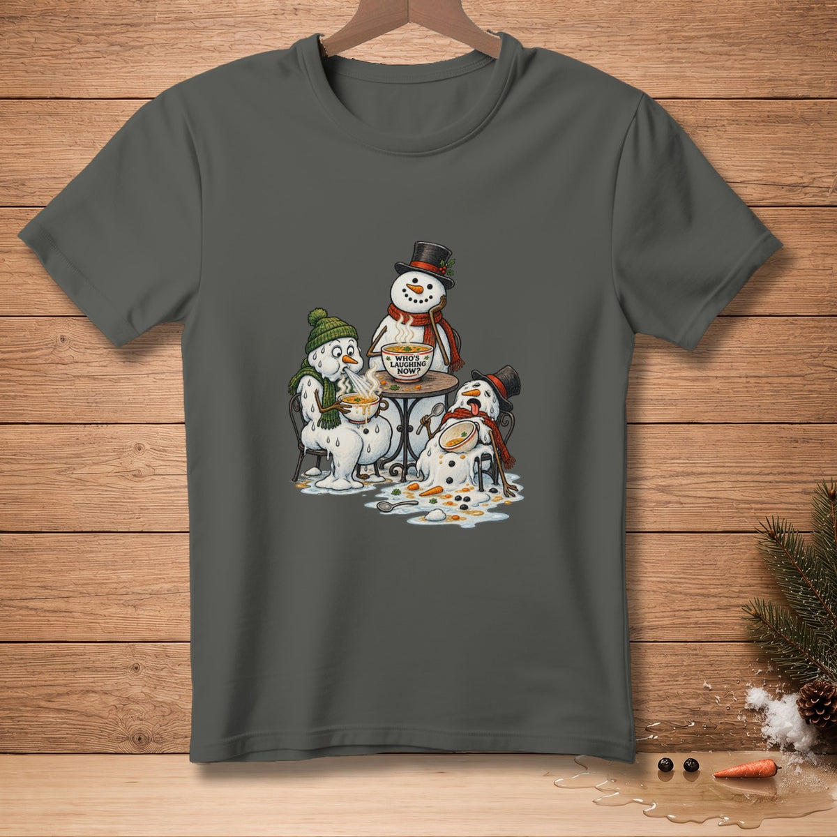 Three melting snowmen sit at a table eating soup, with text reading "WHO'S LAUGHING NOW?"