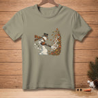 Snowman in top hat and scarf blowing leaves with a leaf blower.