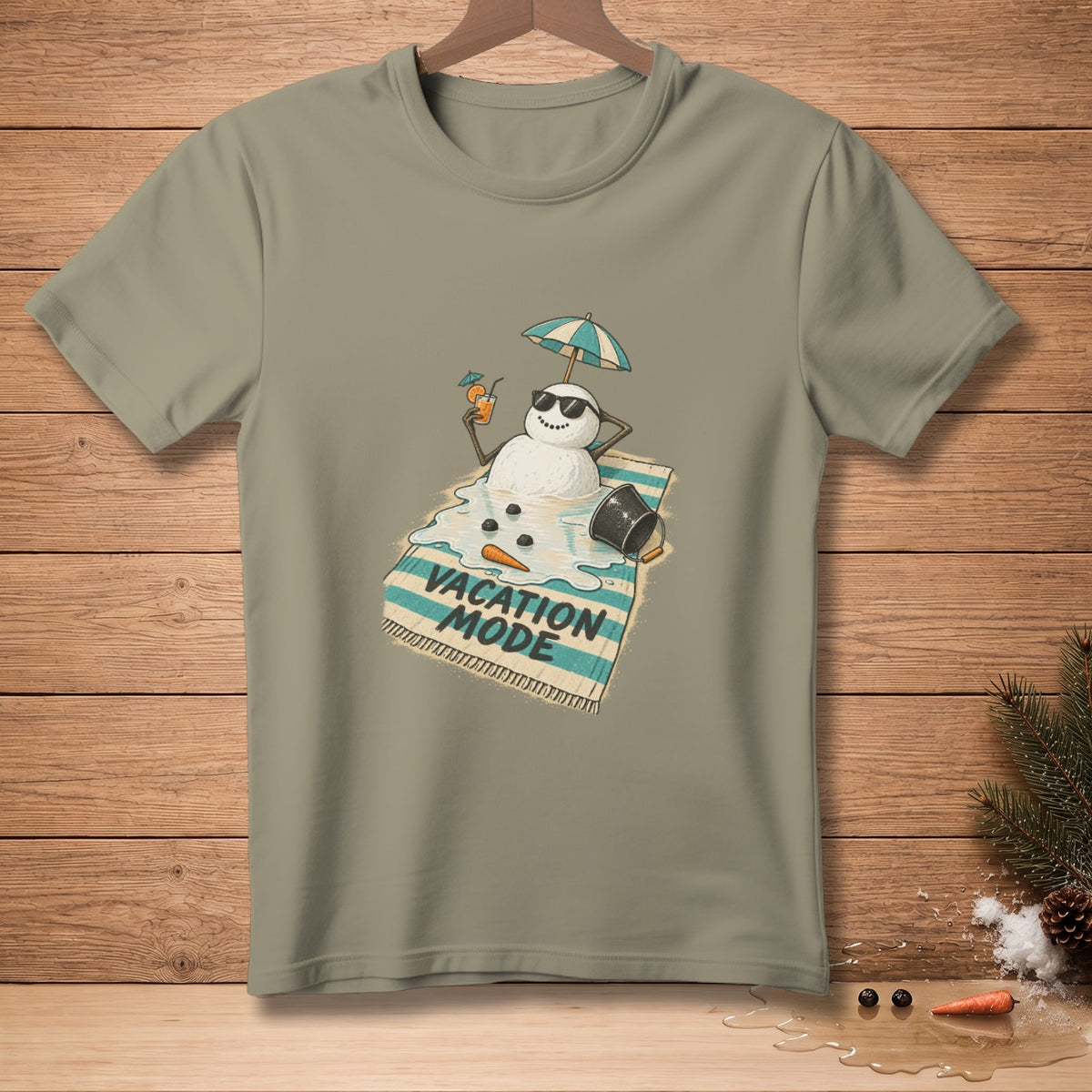 T-shirt with melting snowman on beach towel, "Vacation Mode" text.