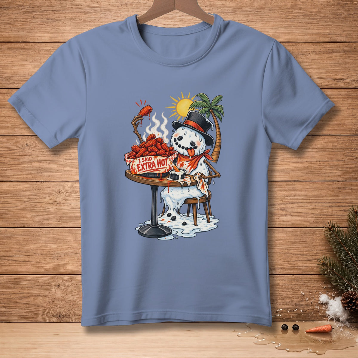 Melting snowman in a top hat eats spicy chicken wings, text says "I Said Extra Hot".