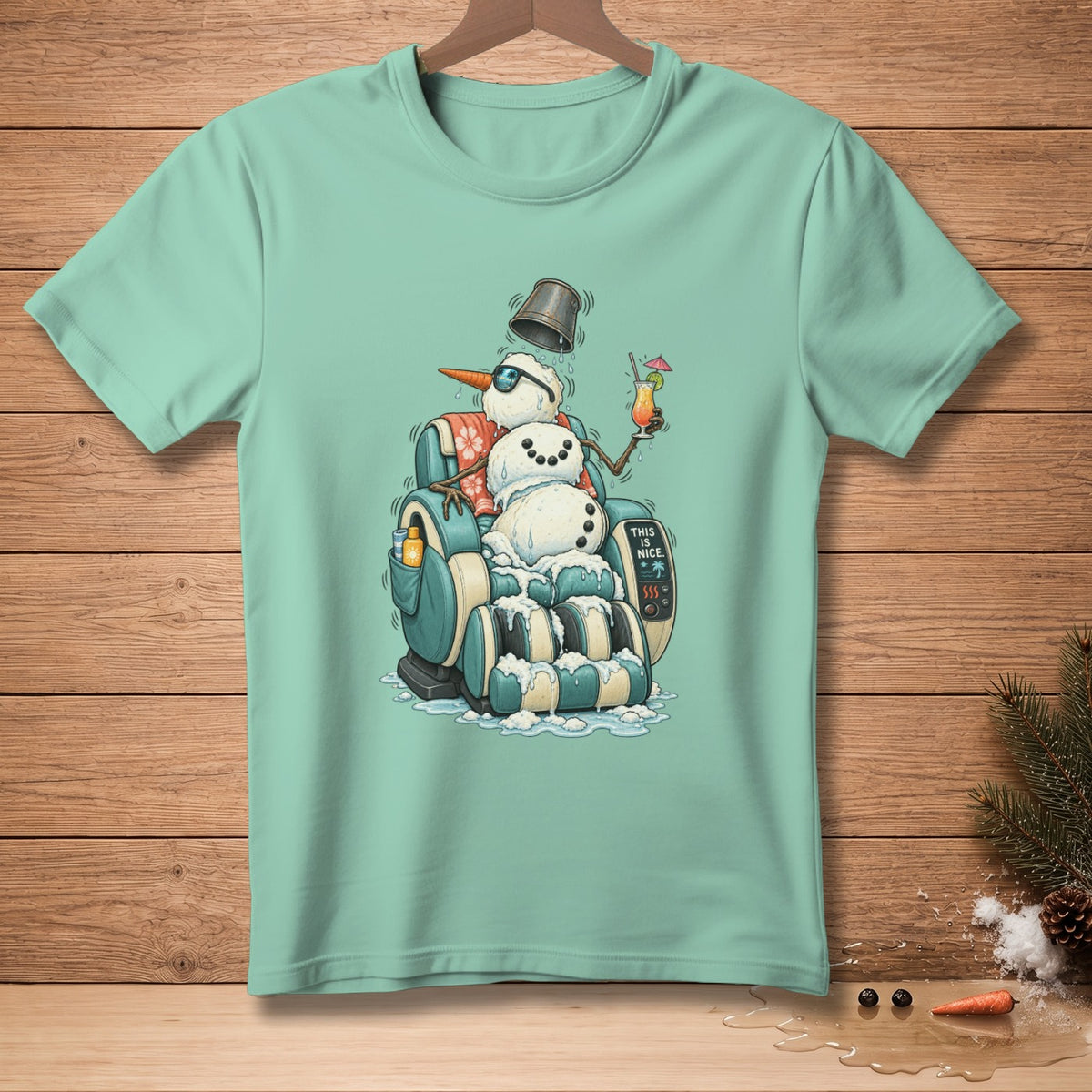 T-shirt with a snowman in a massage chair, holding a drink.