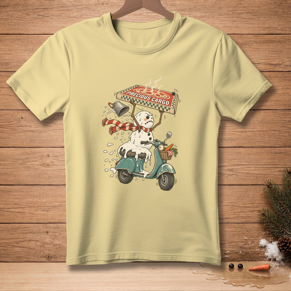 Snowman riding a scooter with a pizza box labeled "Precious Cargo" and a basket of carrots.