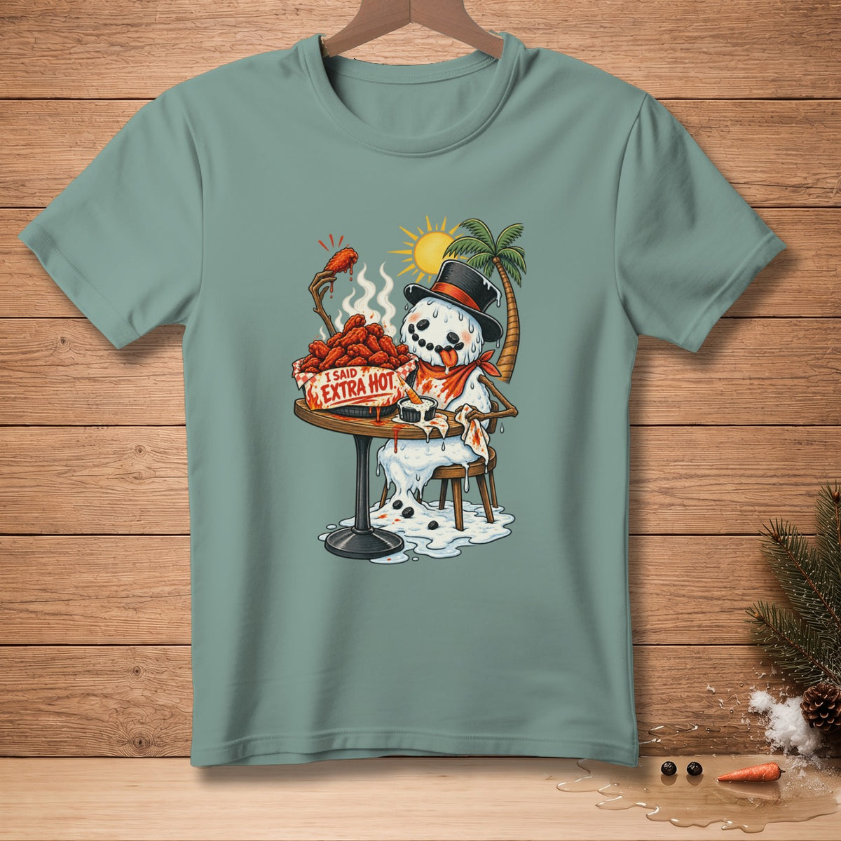 Snowman melting and eating hot wings with "I said Extra Hot" text.