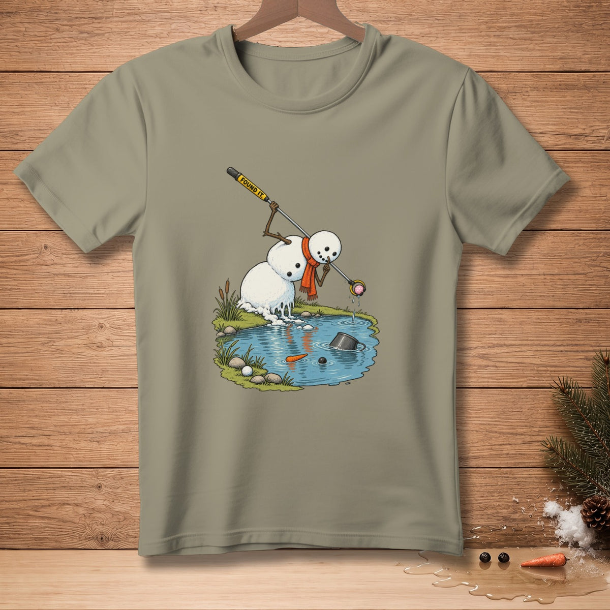 Snowman fishing for a golf ball with a club labeled "Found It."