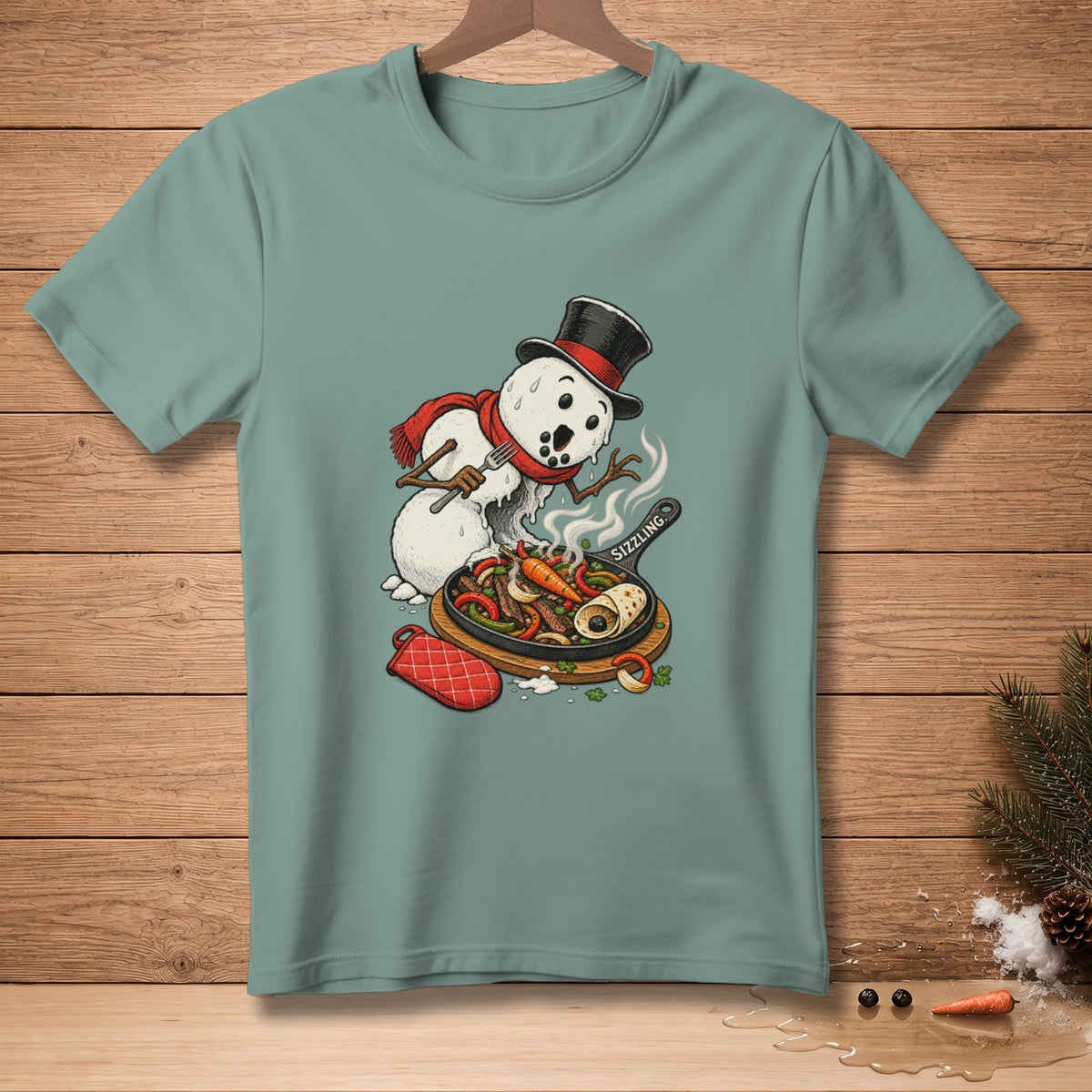 T-shirt with a melting snowman cooking fajitas on a sizzling skillet.