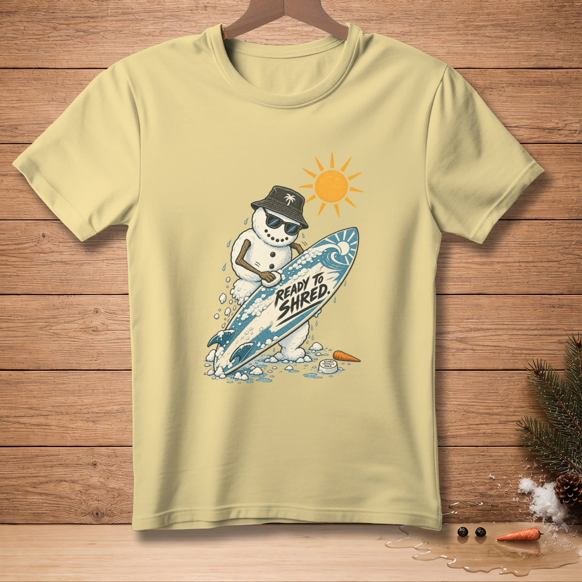 Snowman in bucket hat and sunglasses holds surfboard with "READY TO SHRED" text.