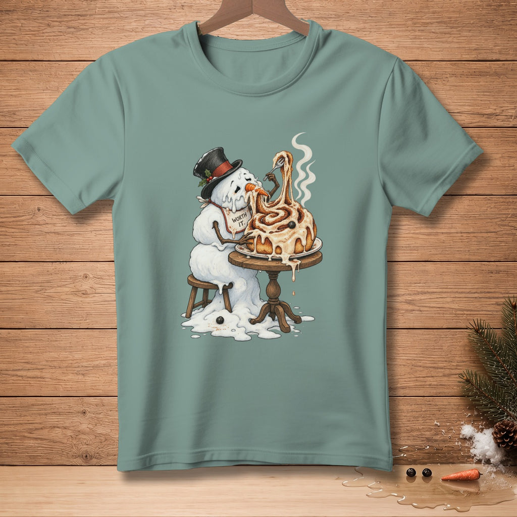 Melting snowman in top hat eats giant cinnamon roll, "Worth It." text on bib.