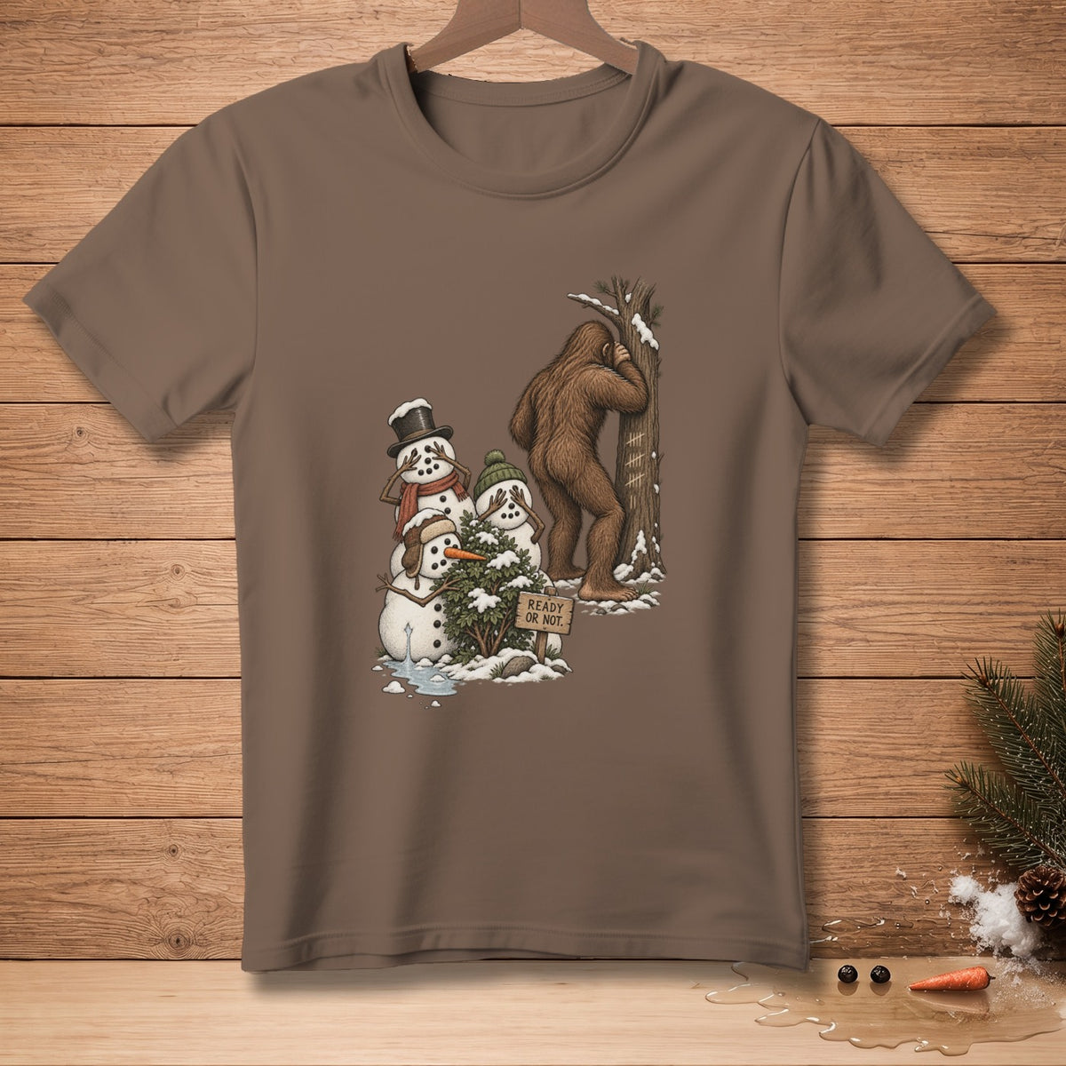 Bigfoot peeking at snowmen playing hide and seek with sign "Ready or Not."