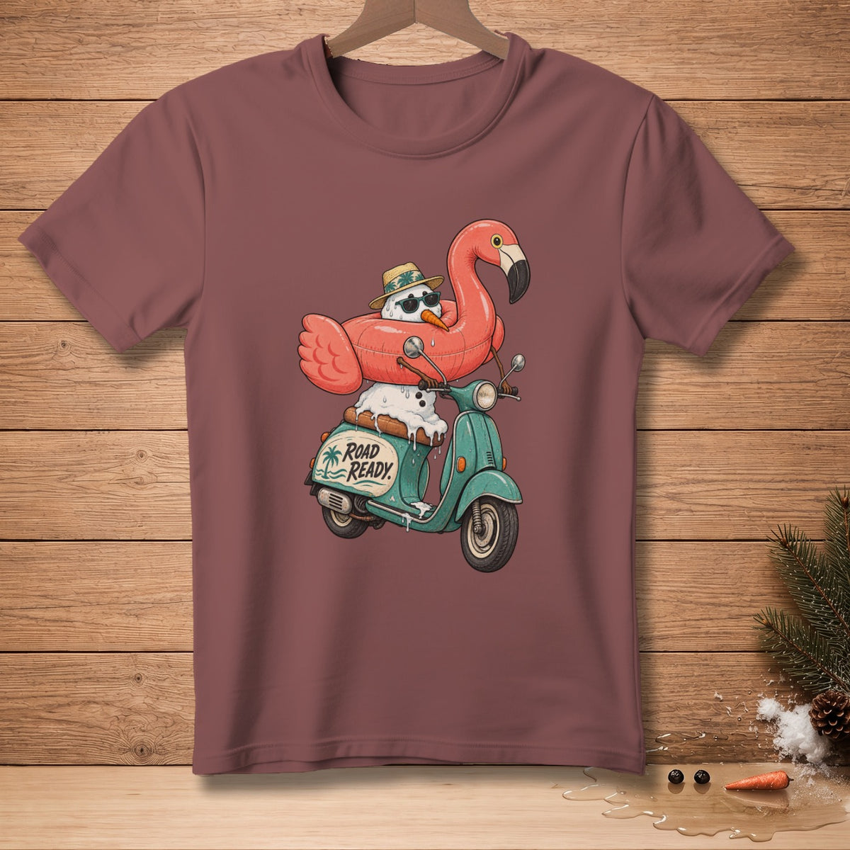 Snowman wearing sunglasses and straw hat rides a scooter with flamingo float.