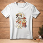 Melting snowman with popcorn spills from a red movie snack cart.