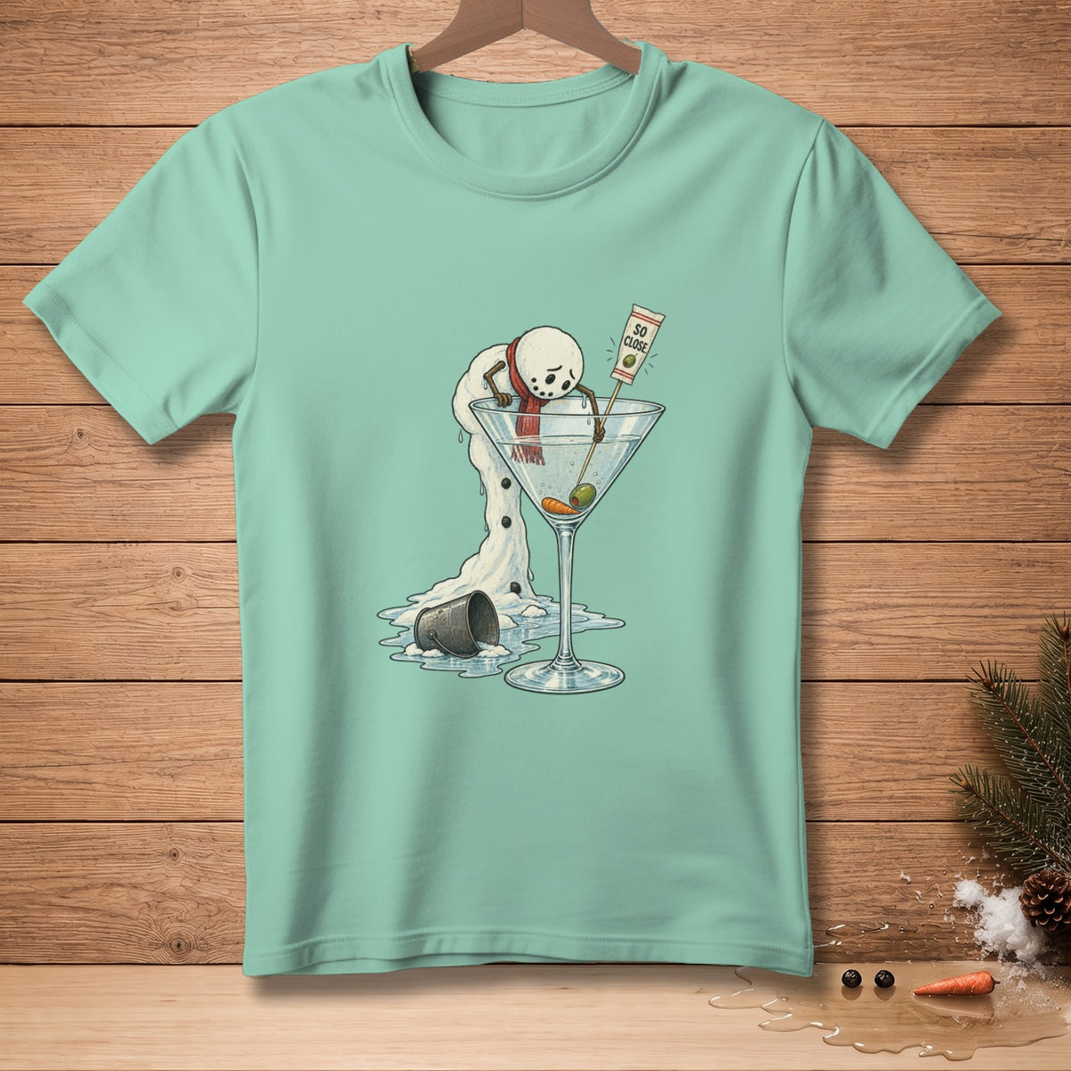 Melting snowman in a martini glass with "So Close" text on garnish.