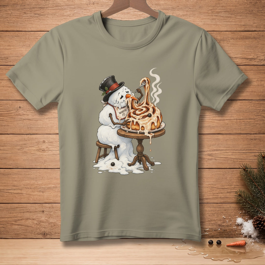 Snowman in top hat eating a giant cinnamon roll with a fork, text "Worth It."