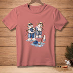 Two melting snowmen in swim trunks and hats on a pink t-shirt.